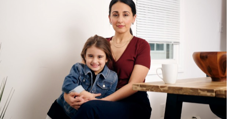 Image of a Healthcare Professional talking with a patient with text that says - Should I stay on treatment while trying to get pregnant? How can I protect myself against relapses after my baby is born?