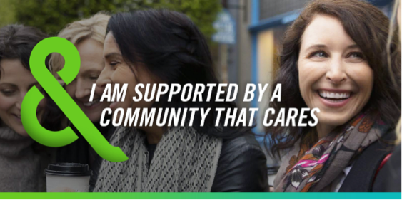 Image of a woman in a car with text that says – I AM SUPPORTED BY A COMMUNITY THAT CARES